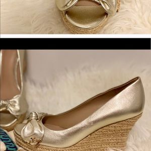 A Tory Burch peep tow gold wedges